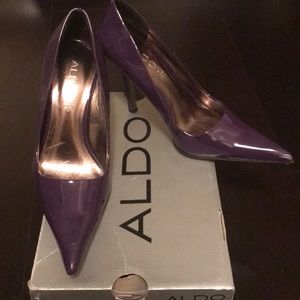 Purple pointed heels.